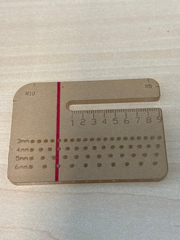 Leather punch aid for pulling out pricking iron