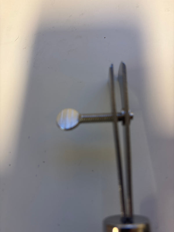 Adjustable Width Groove Pressing Machine with a Handle for Leather Crafting, Designed to Assist in Pressing Edge Lines on Handmade Leather Products.