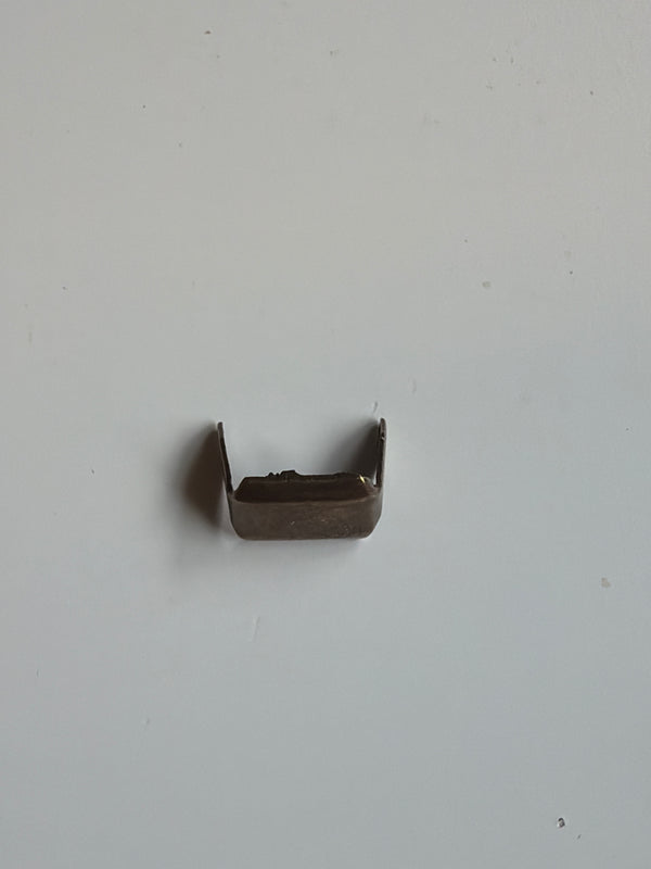 Metal staples for straps