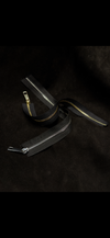 Metal staples for straps