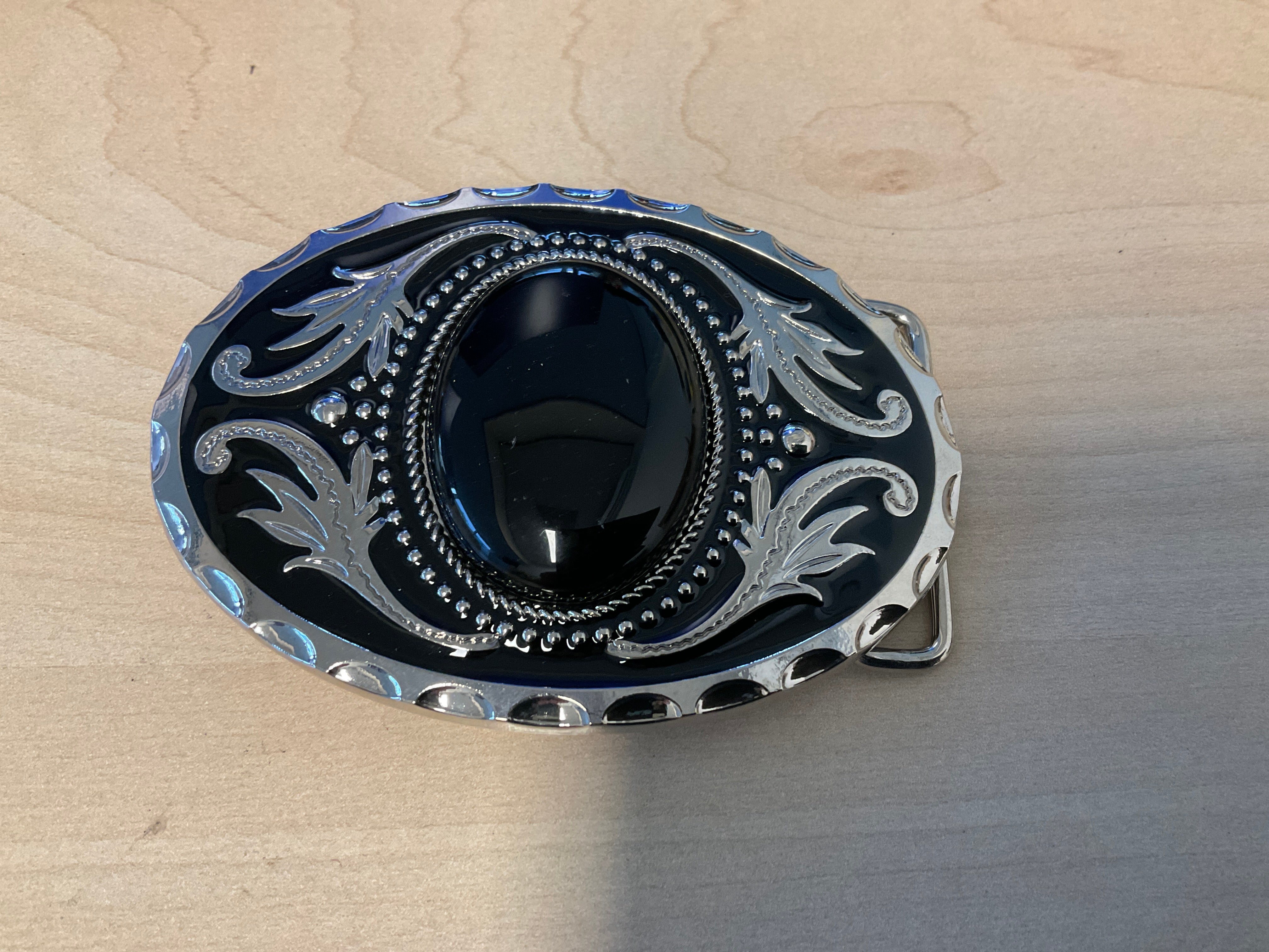 Cowboy black gem oval belt buckle